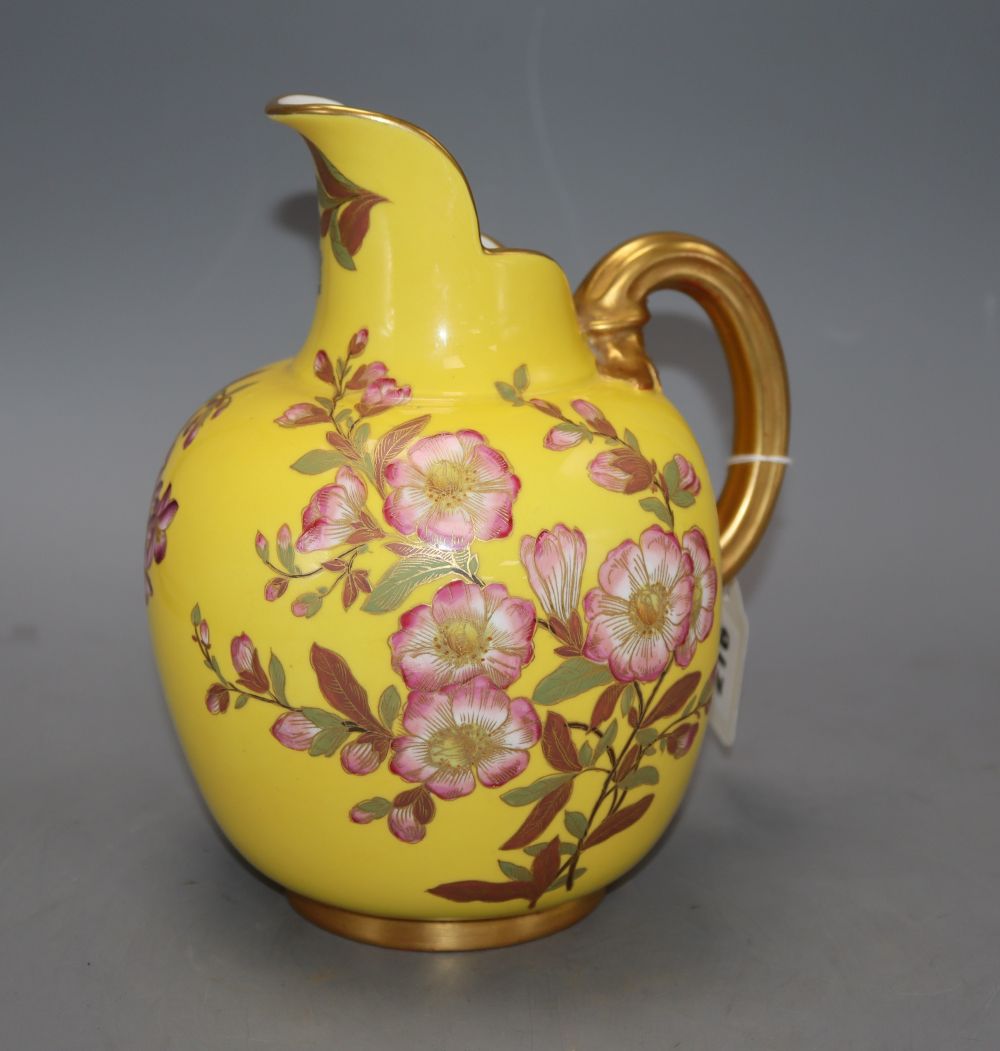 A Royal Worcester yellow ground jug, height 21cm
